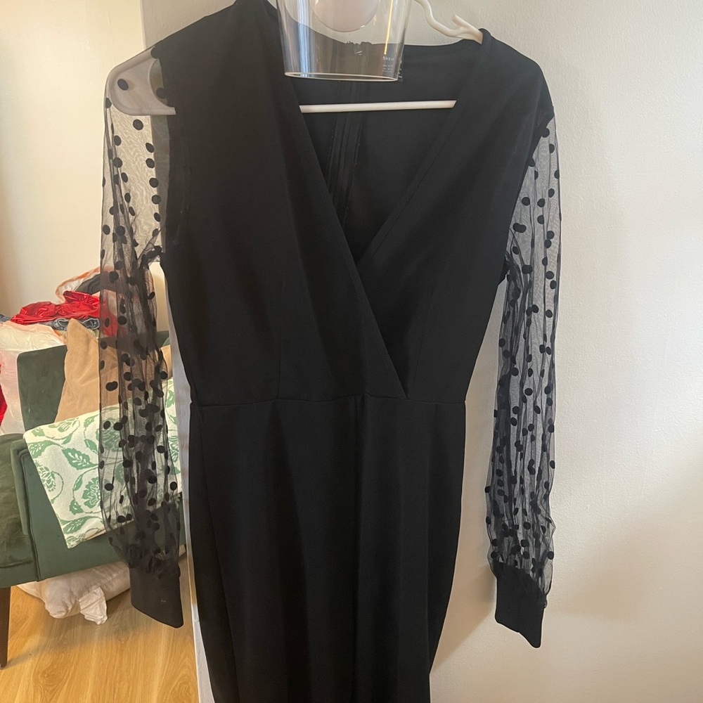 Elegant Black Dress with Sheer Polka Dot Sleeves